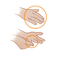 Två händer som rör vid varandra med fingrarna.
