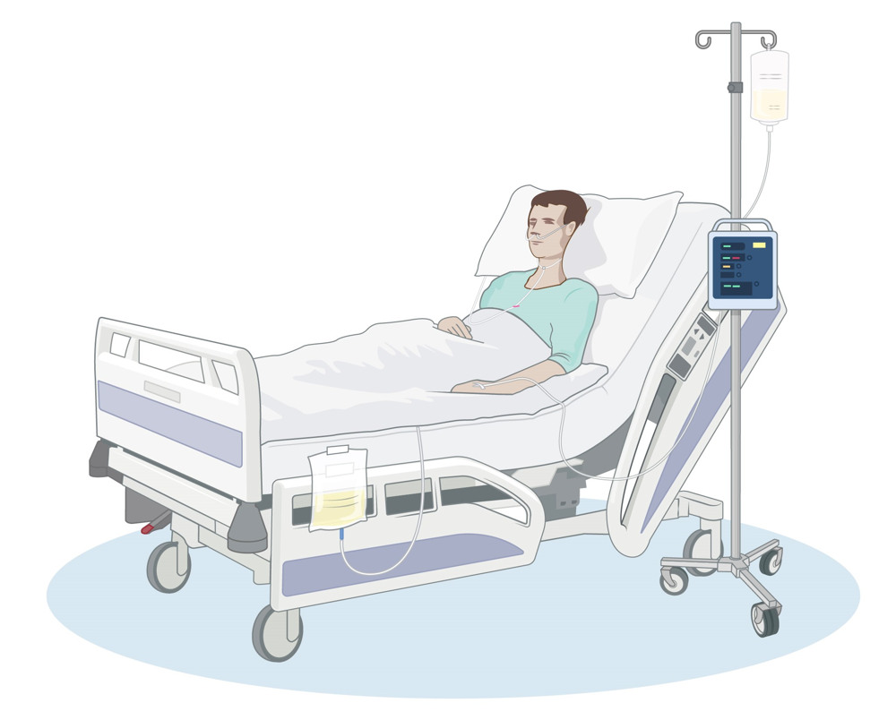 Sövd patient ligger i en sjukhussäng, uppkopplad till medicinsk utrustning. Intill står en droppställning med hjul.