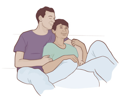 Illustration av ett par som sitter ned och håller om varandra.